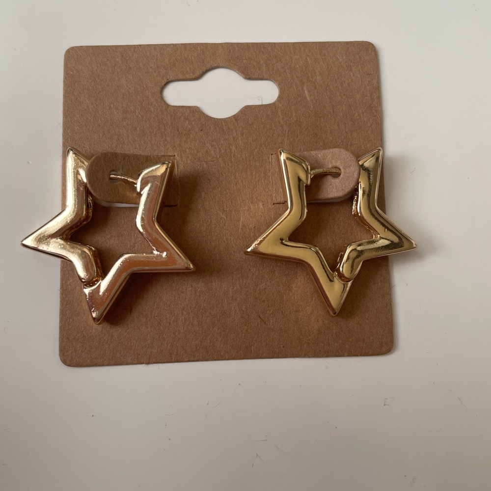 Gold star huggie earrings